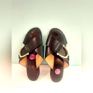 Leather upper sandal with buckle.